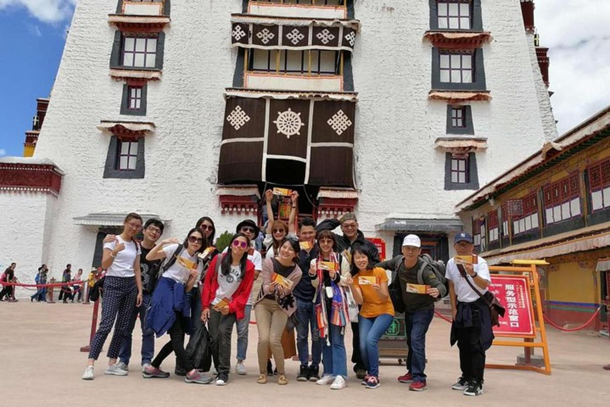 a group of people standing in front of a building