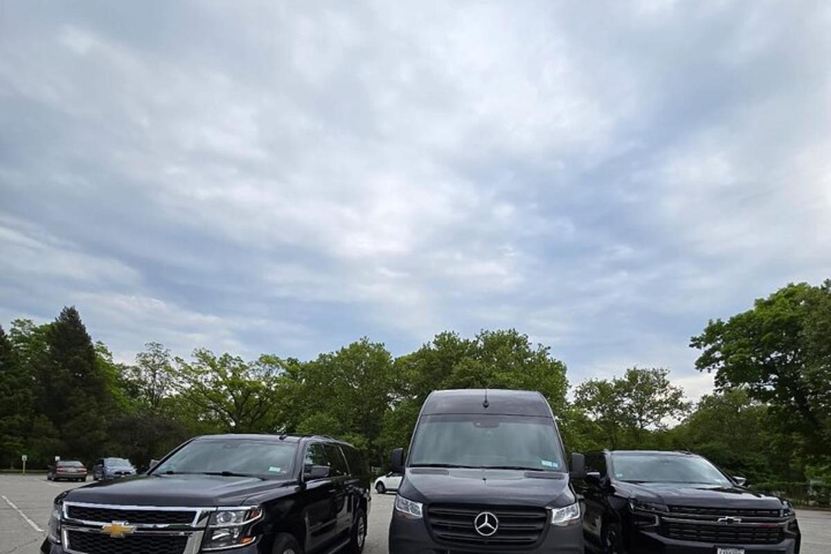 three trucks parked in a parking lot