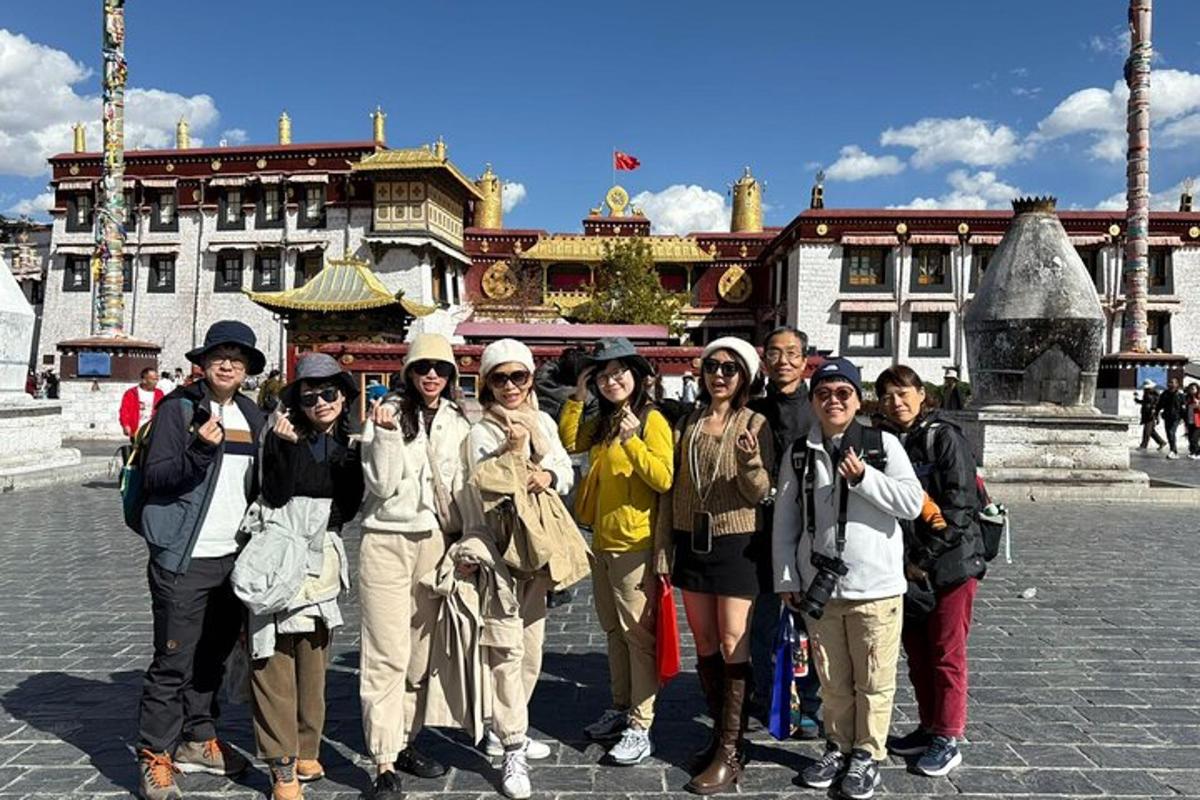 a group of people standing in front of a building