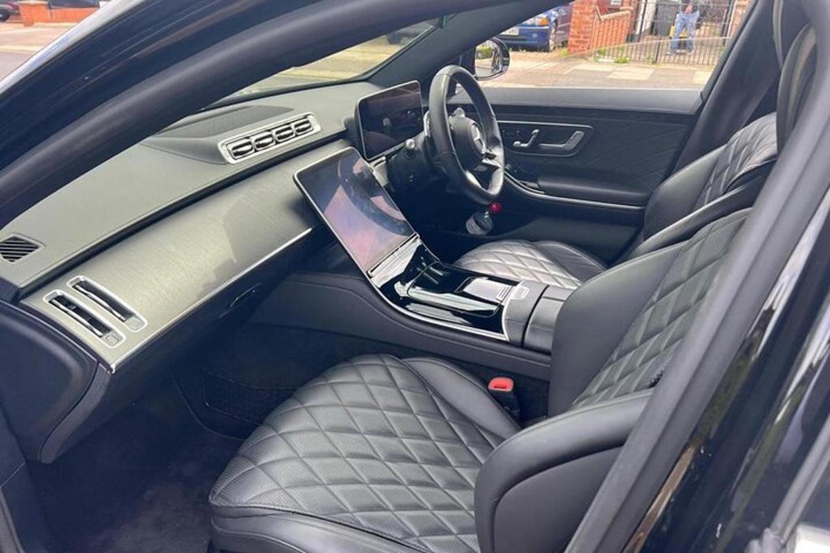a car with the backseat of a car with the door open