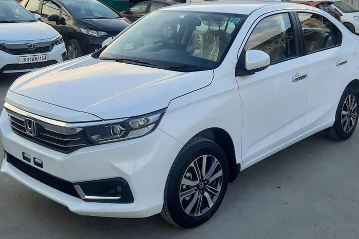 a white car parked in a parking lot