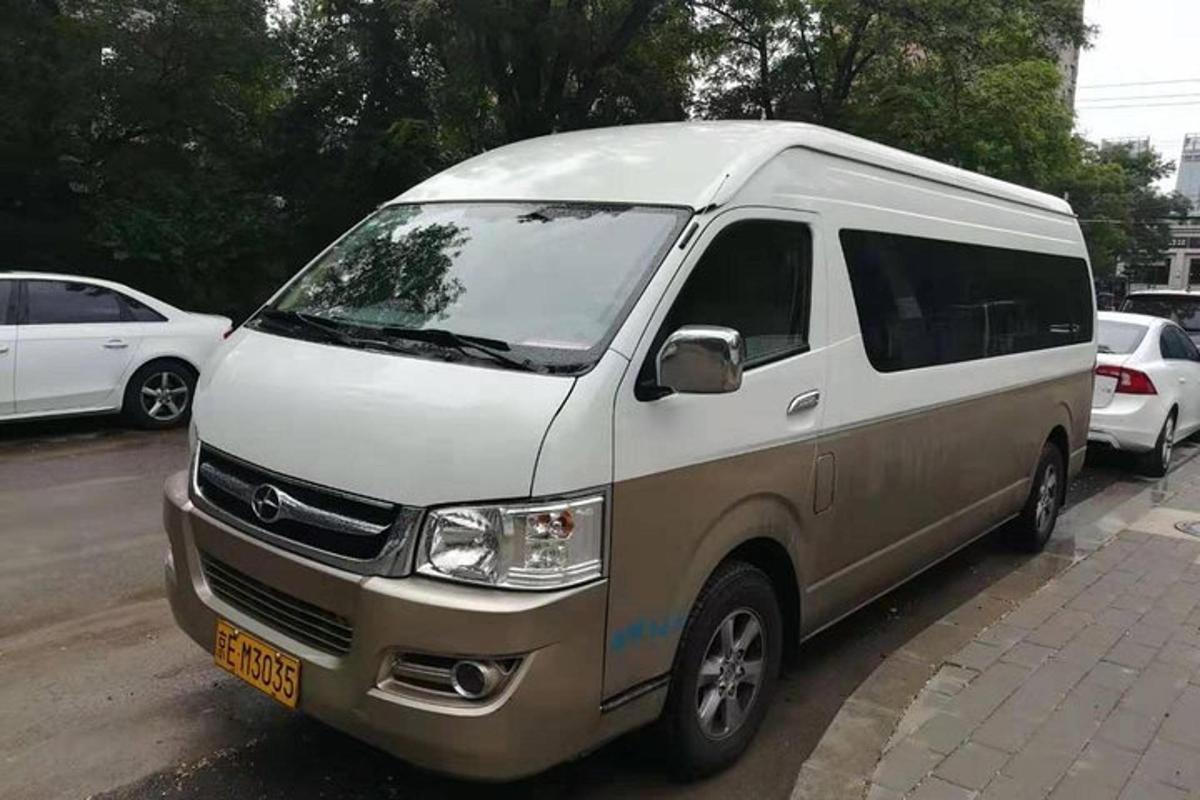 a white van parked in a parking lot
