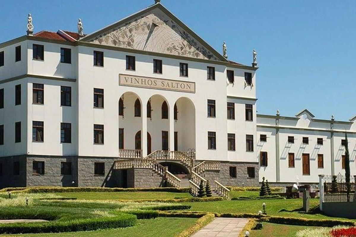 a large white building with a sign on it