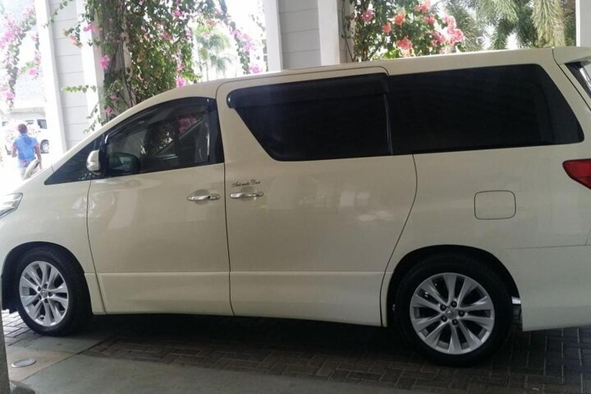 a white van is parked on a street