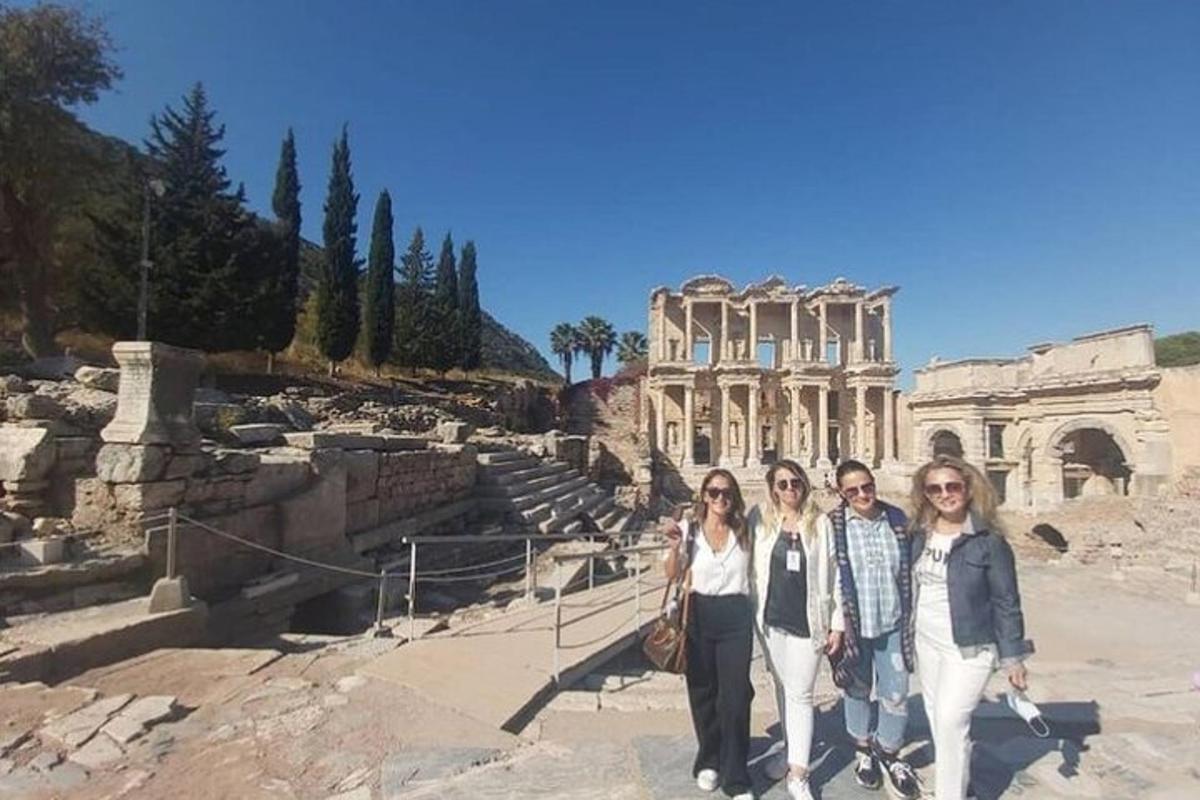 a group of people standing in front of a building