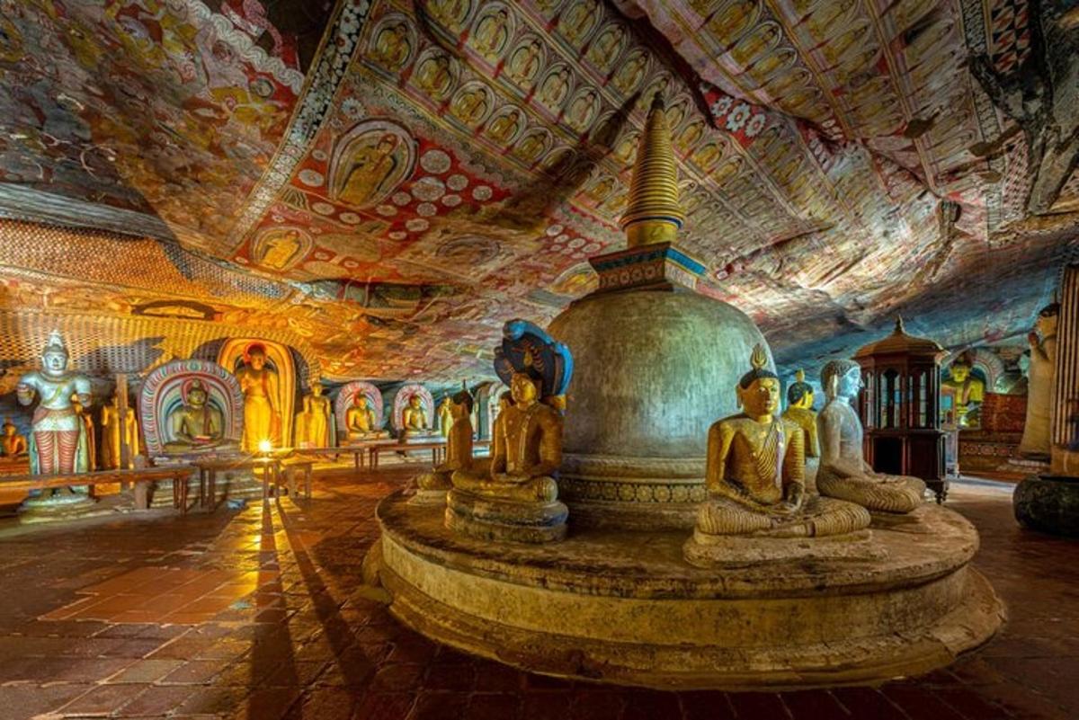 a room with statues in a large room with a ceiling
