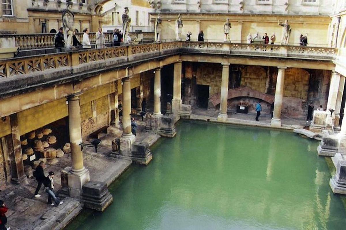 a large pool of green water in a building