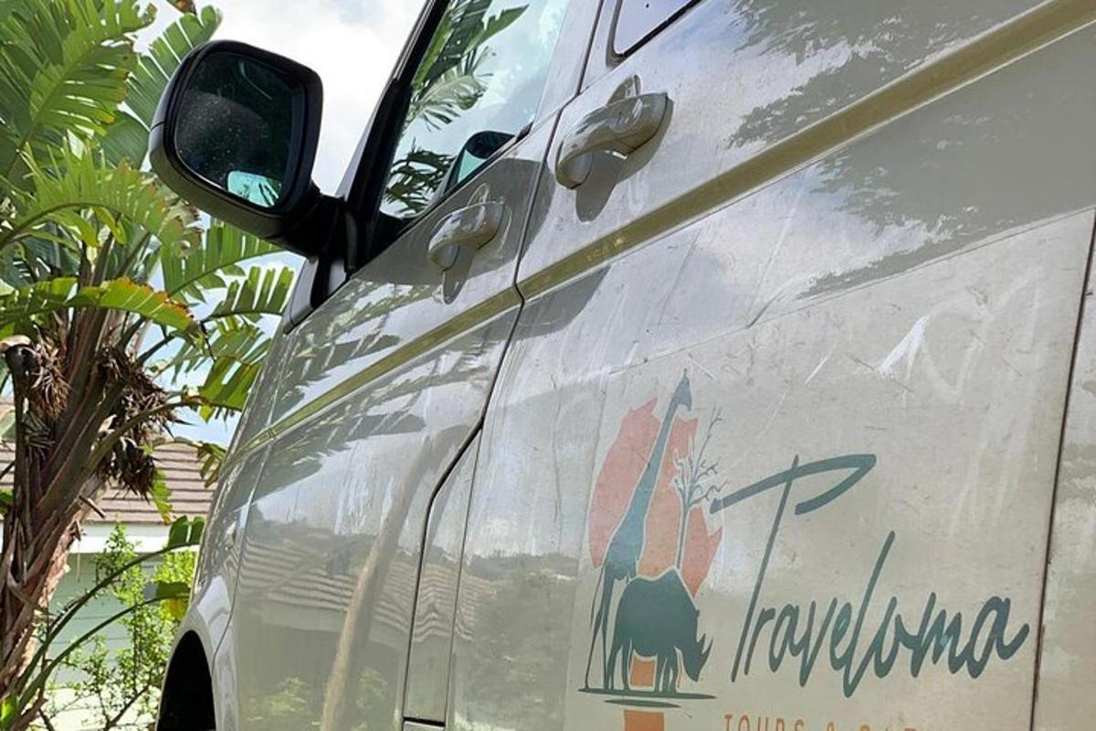 a white van with a logo on the side of it