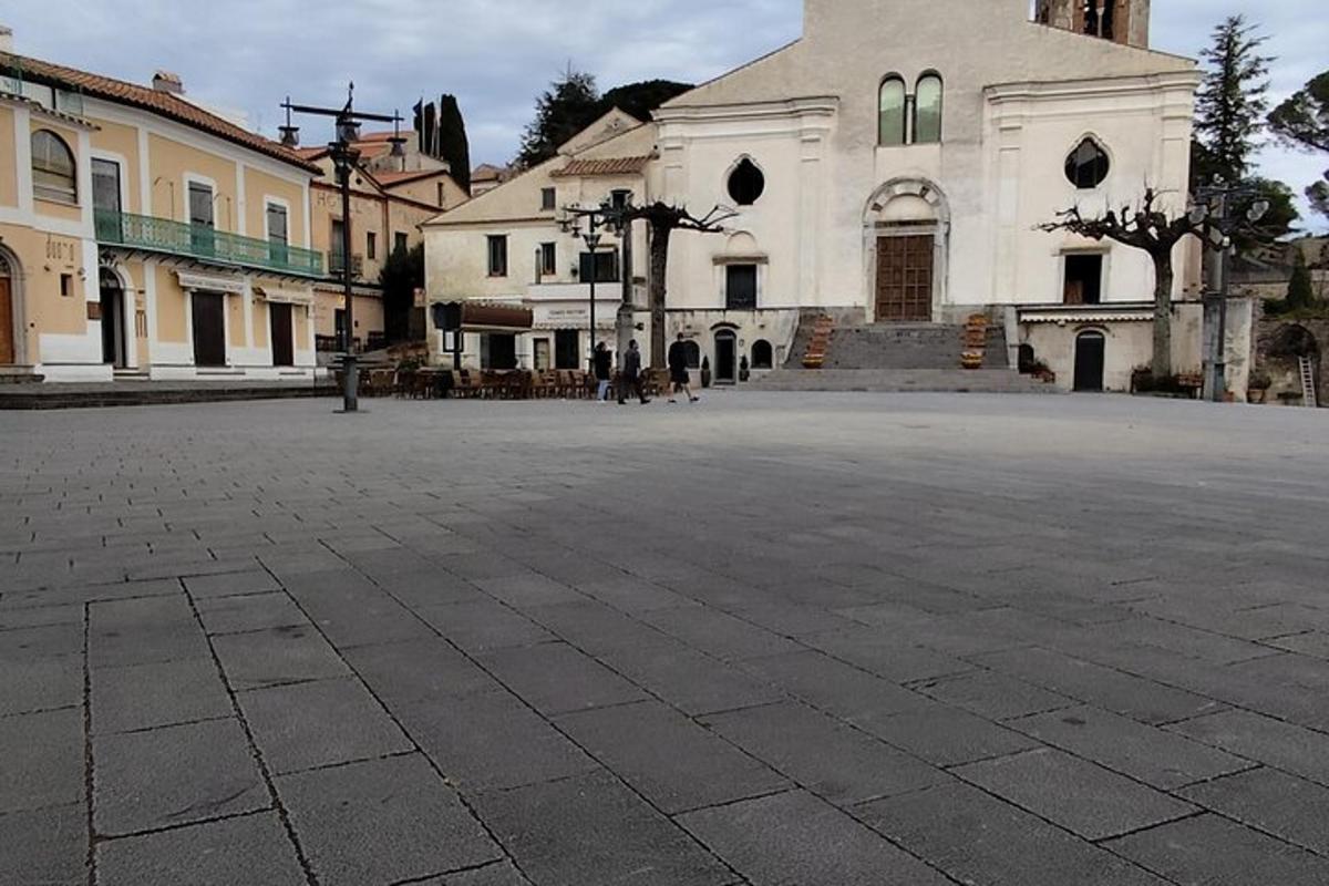 an empty street in front of a large building