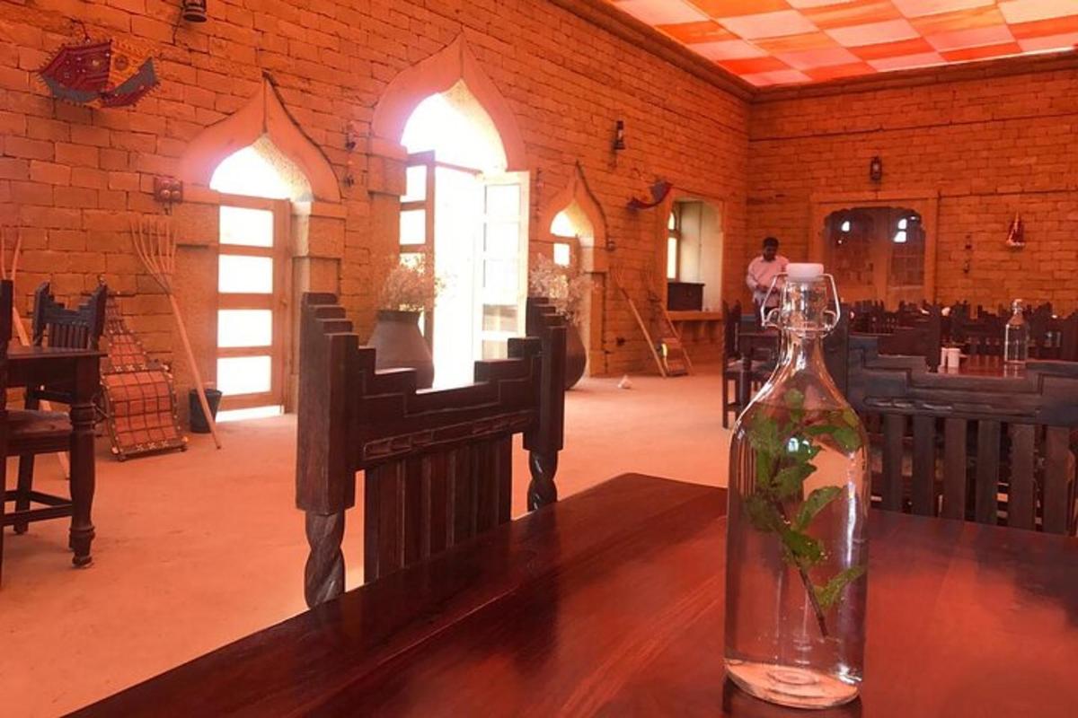 a bottle of water sitting on a table in a room
