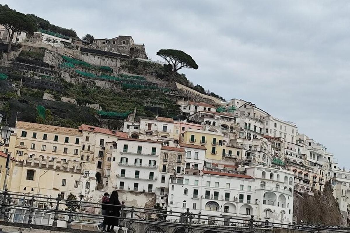 a group of buildings on the side of a mountain