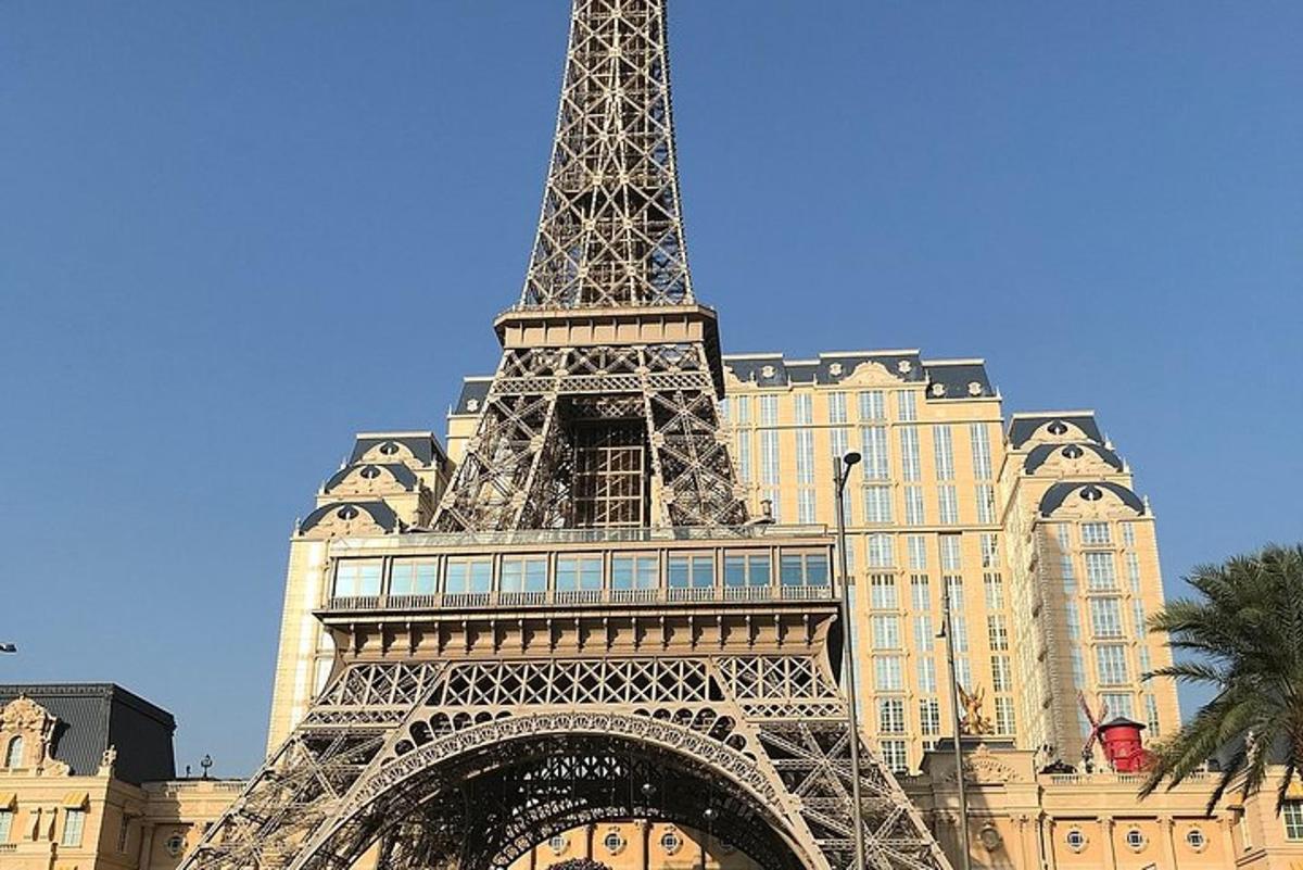 a view of the eiffel tower in front of a building