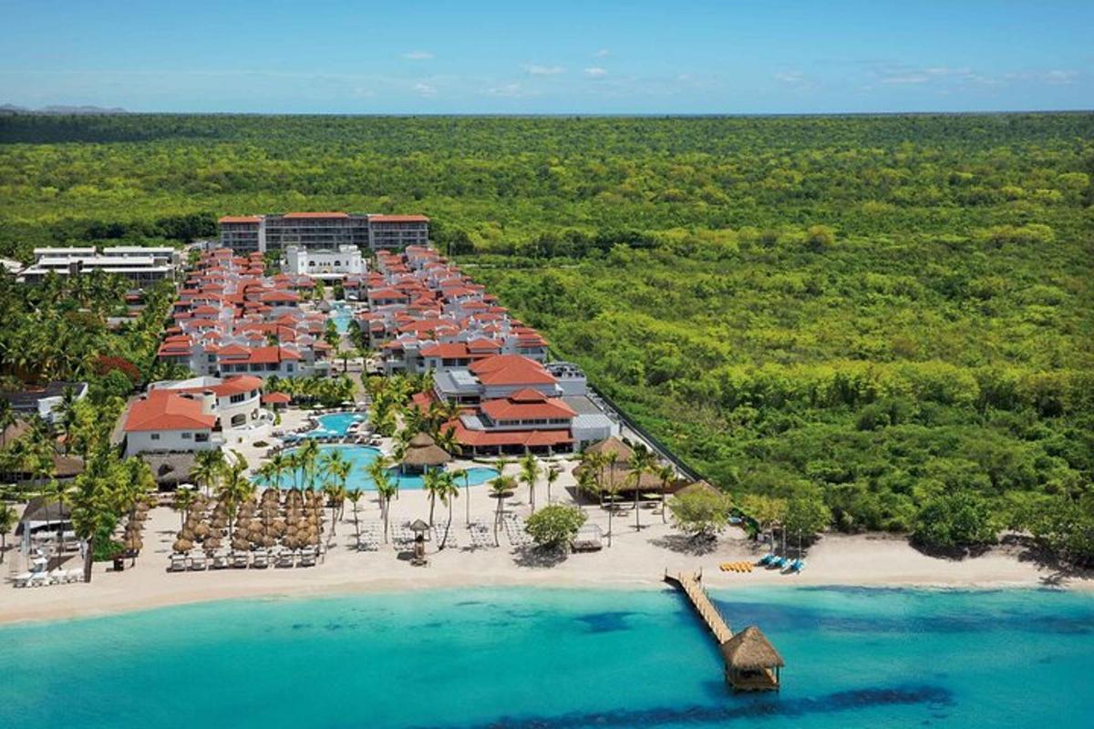 an aerial view of a resort on a beach