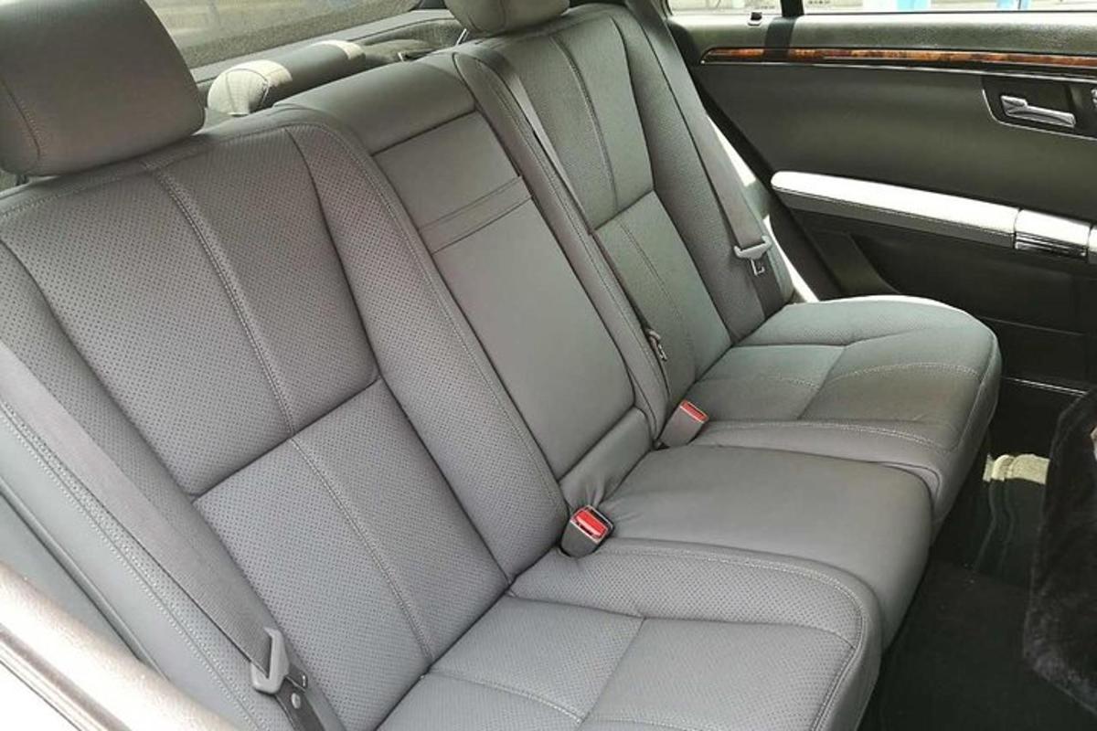 a car seat in the backseat of a car
