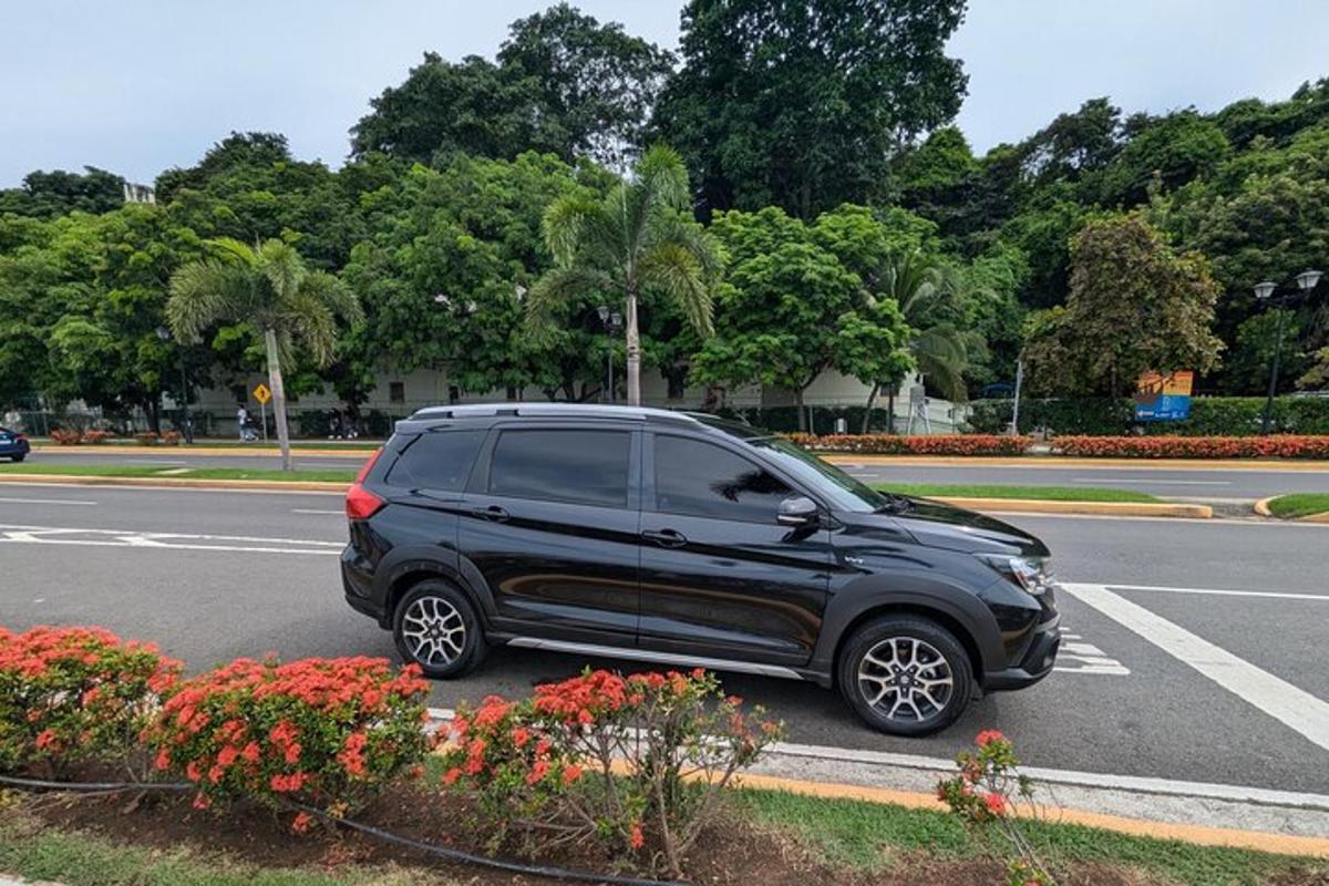 a black suv parked in a parking lot