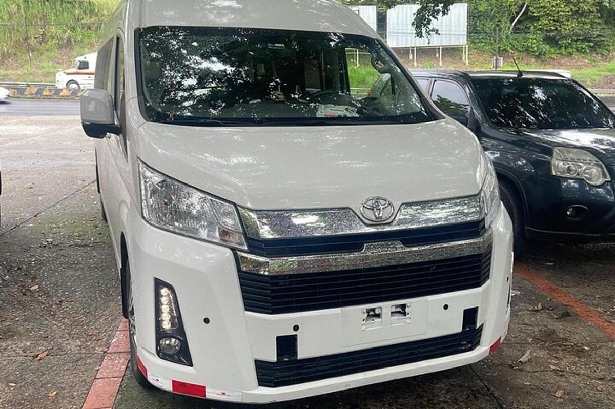 a white van parked in a parking lot