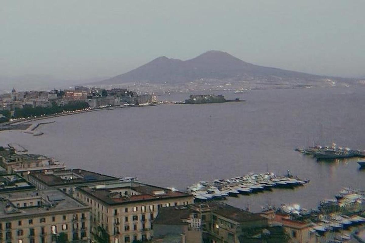 a view of a large body of water with boats