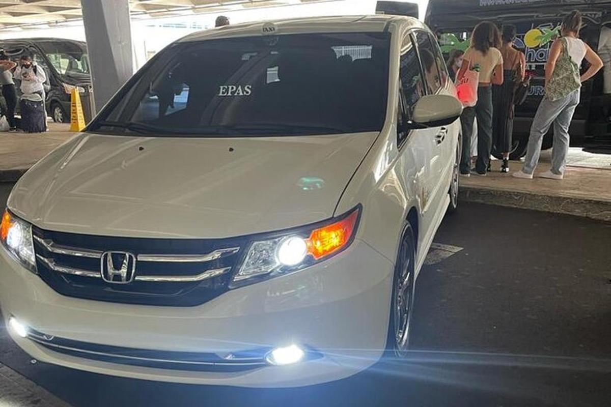 a white car parked in a parking lot