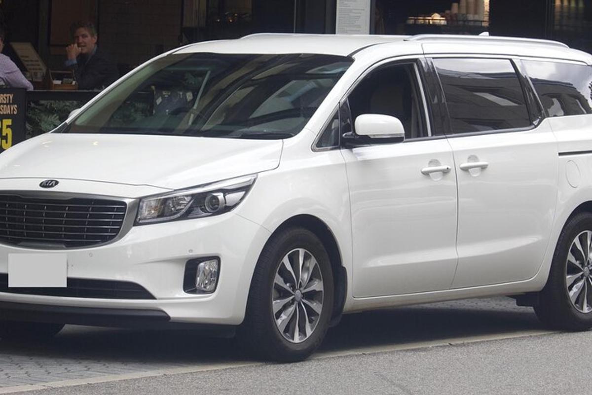 a white van parked on a city street