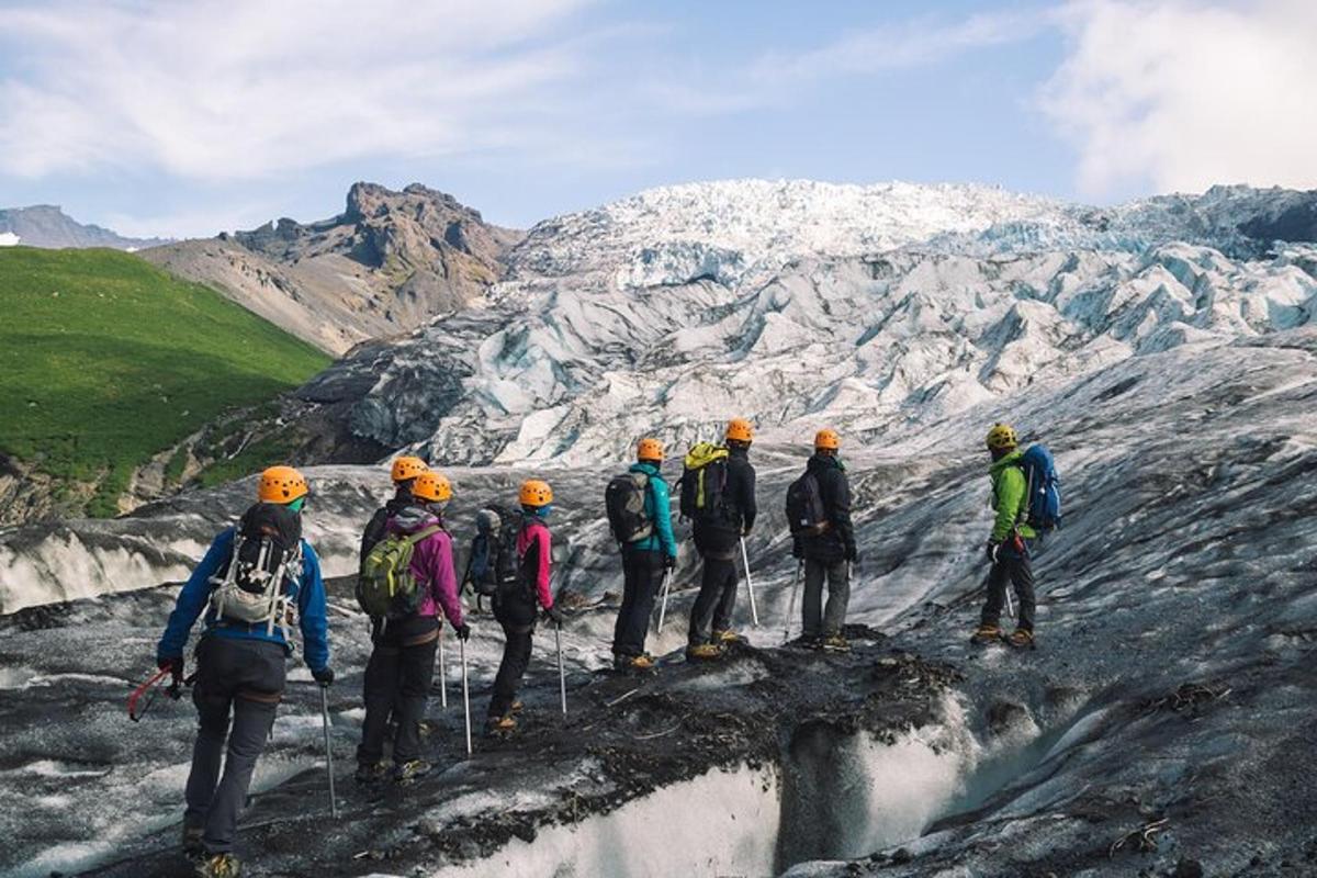 a group of people standing on top of a mountain