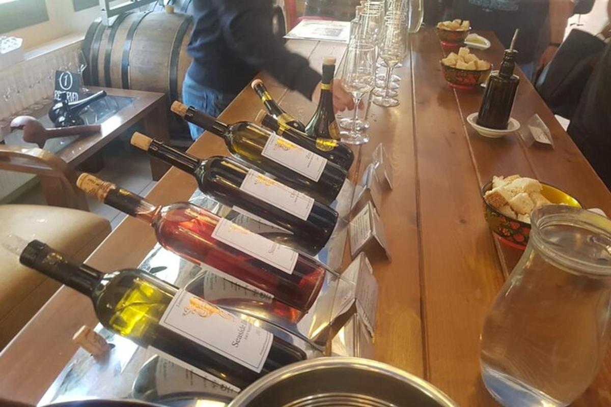 a bunch of bottles of wine on a table