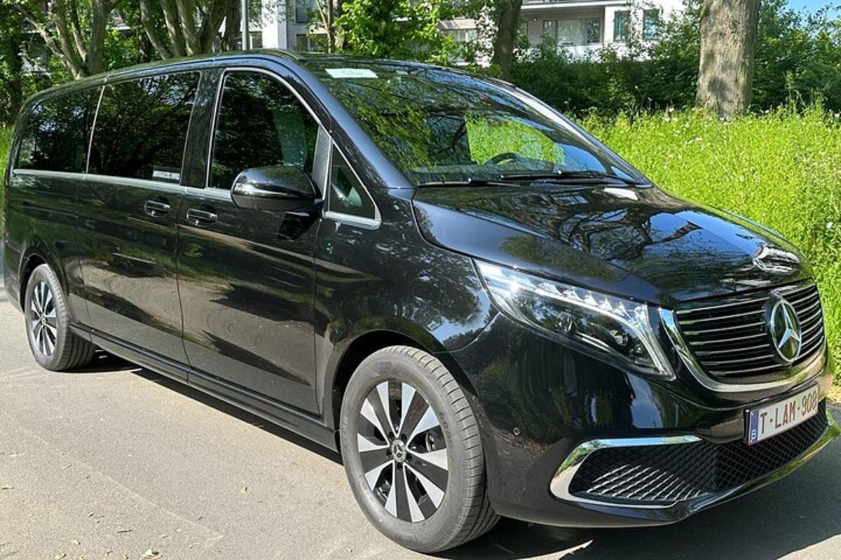 a black van parked on the side of a street