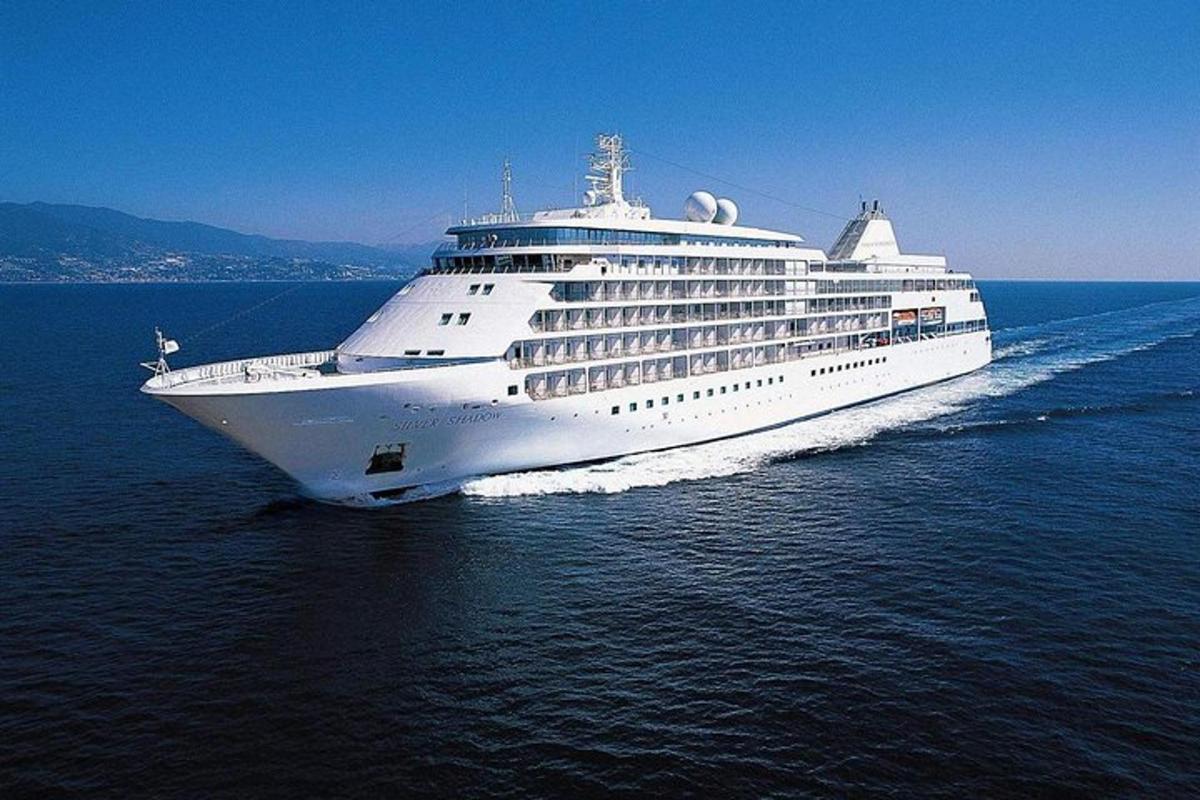 a cruise ship in the ocean on the water