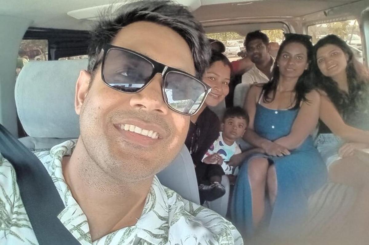 a group of people sitting in a car