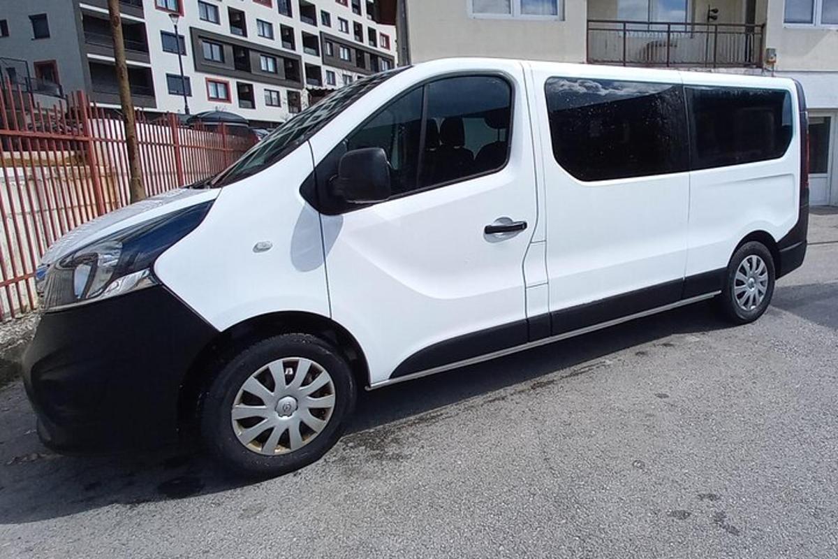 a white van parked in a parking lot