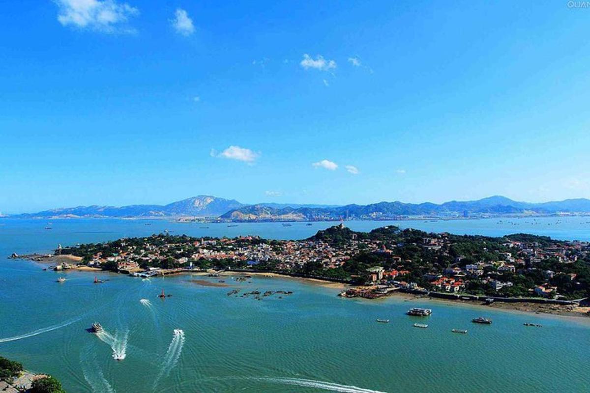an aerial view of a small island in the water