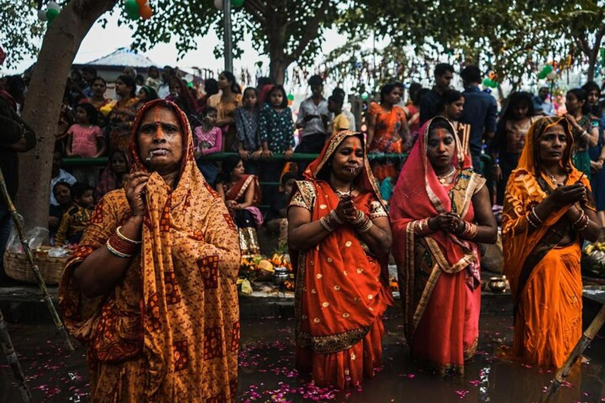 a group of women standing in front of a crowd