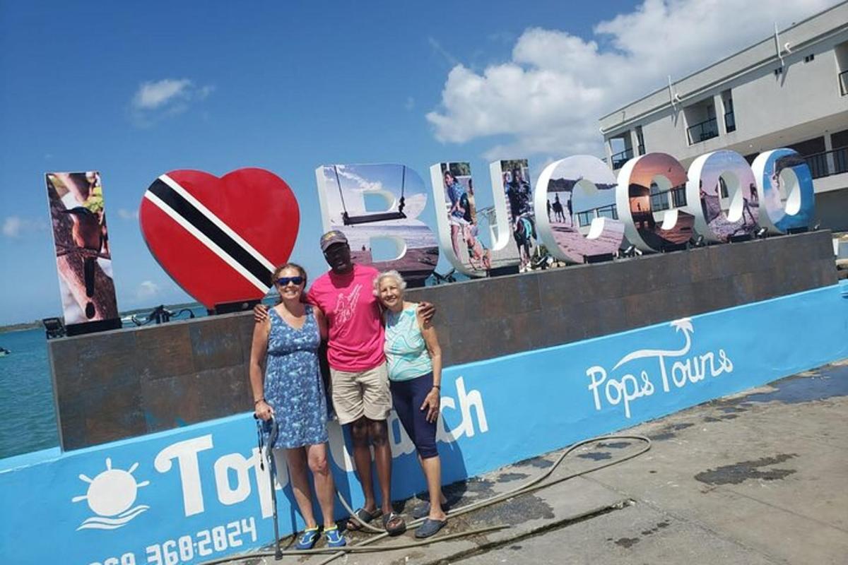a group of people standing in front of a sign