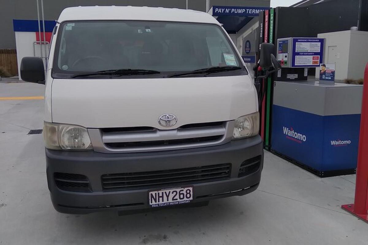 a white van is parked in a garage