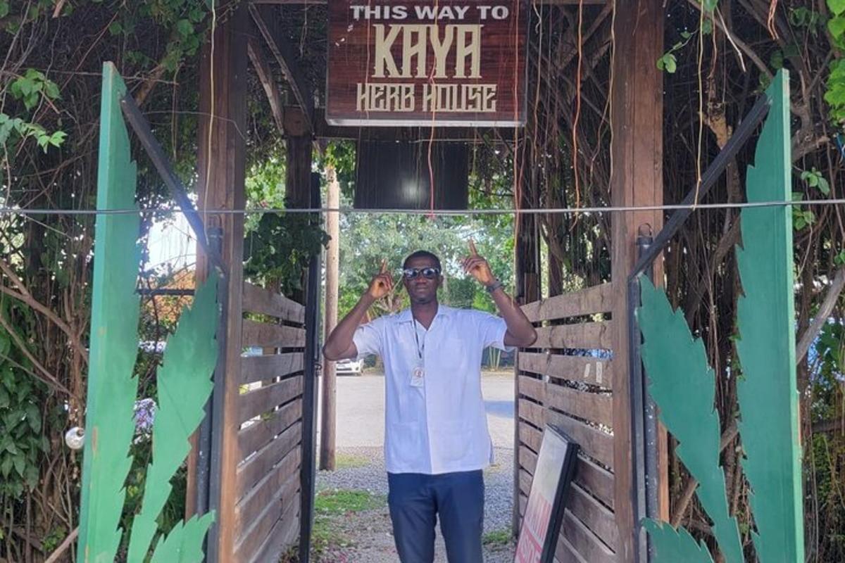 a man standing in the doorway of a sign