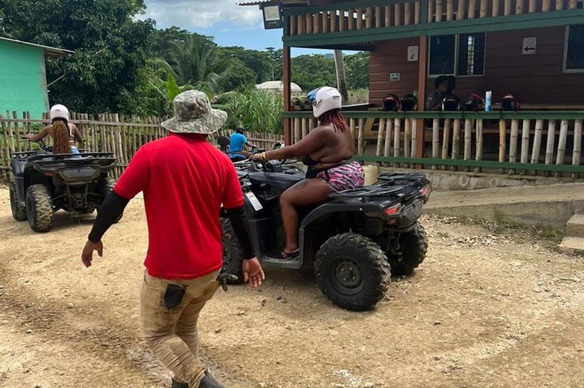 a group of people on atvs and a woman sitting on top