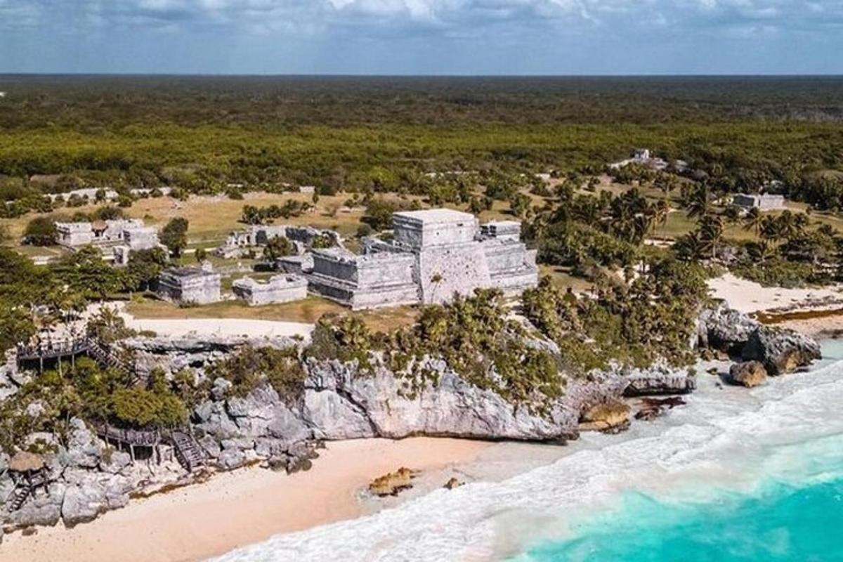 an aerial view of a resort on a beach