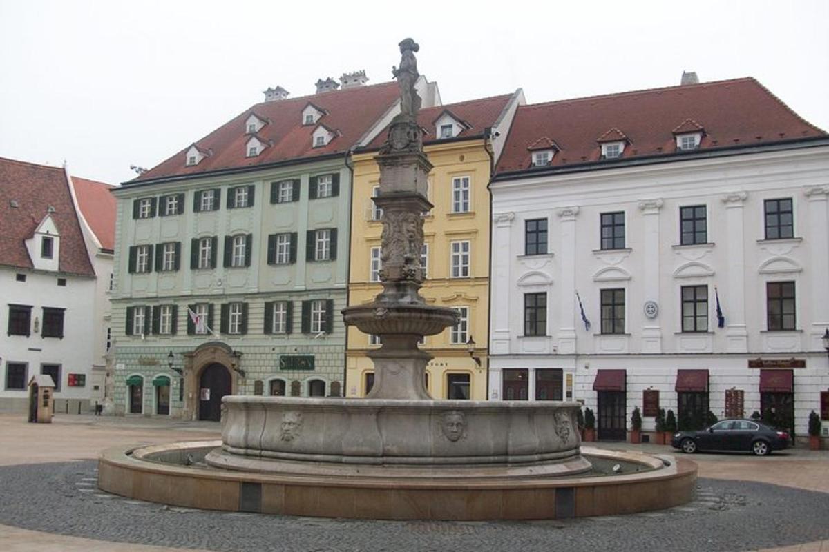 a large fountain in front of a building