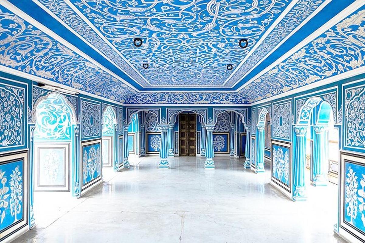 a blue room with a ceiling painted in blue and white