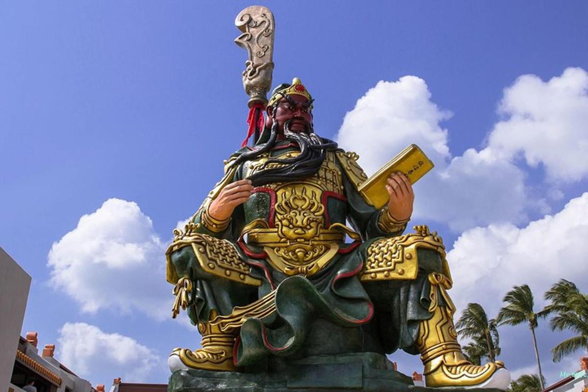 a statue of a man sitting on top of an elephant