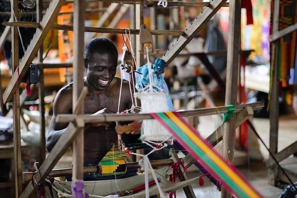 a young boy playing with a toy in a machine