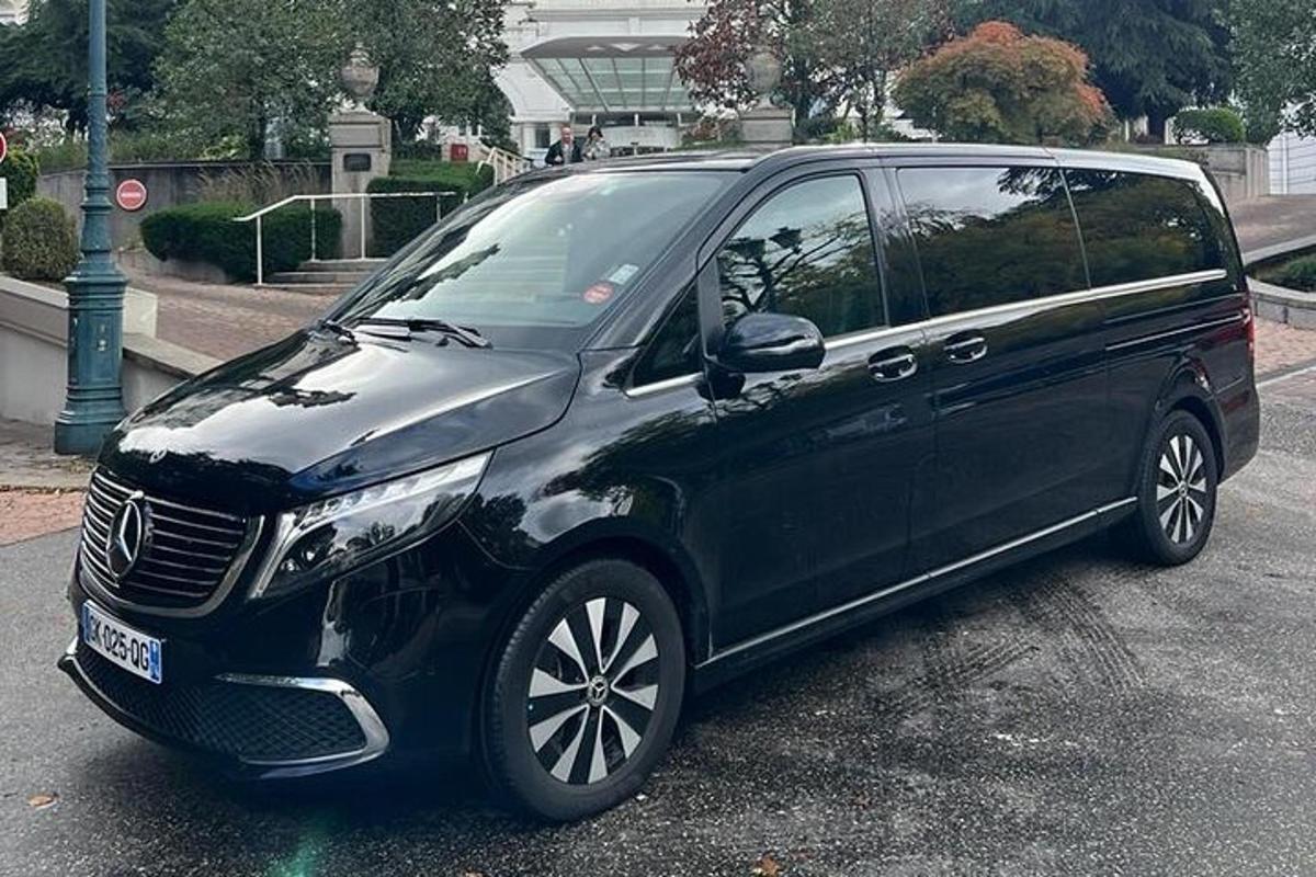 a black suv parked in a parking lot