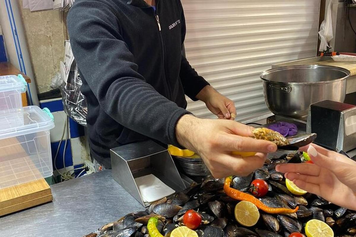 a person preparing food on top of a table