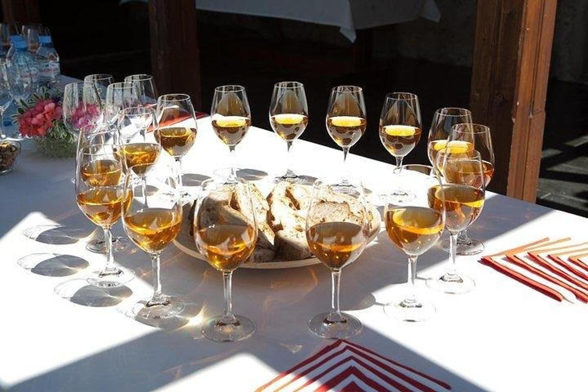 a group of wine glasses sitting on a table