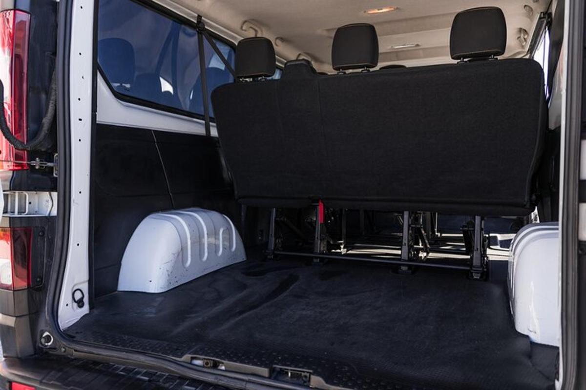 an open back seat of a van with the back seatservation