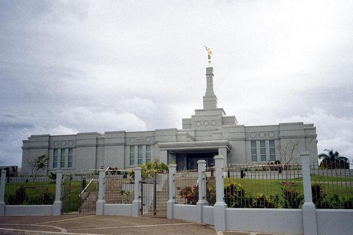 a large white building with a tower on top of it