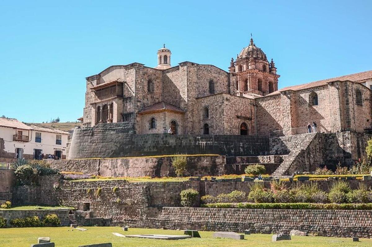 a large stone building on top of a hill