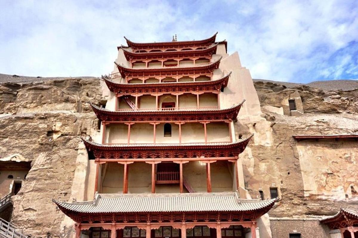 a tall building on the side of a mountain