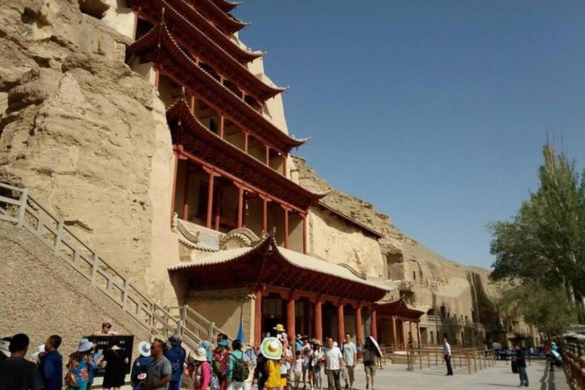a group of people standing in front of a building