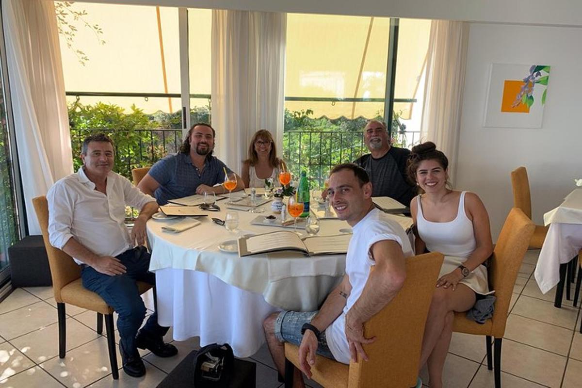 a group of people sitting around a table