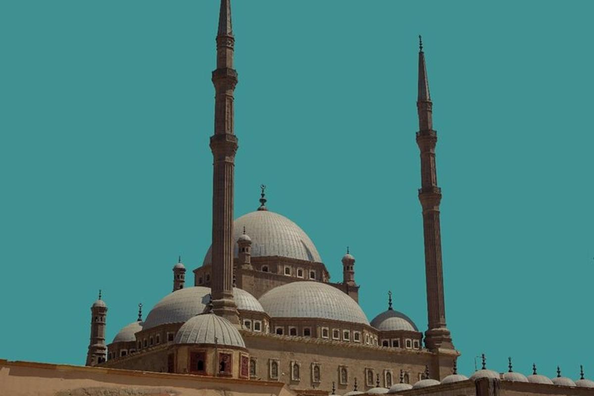 a mosque with two large domes and two minarets